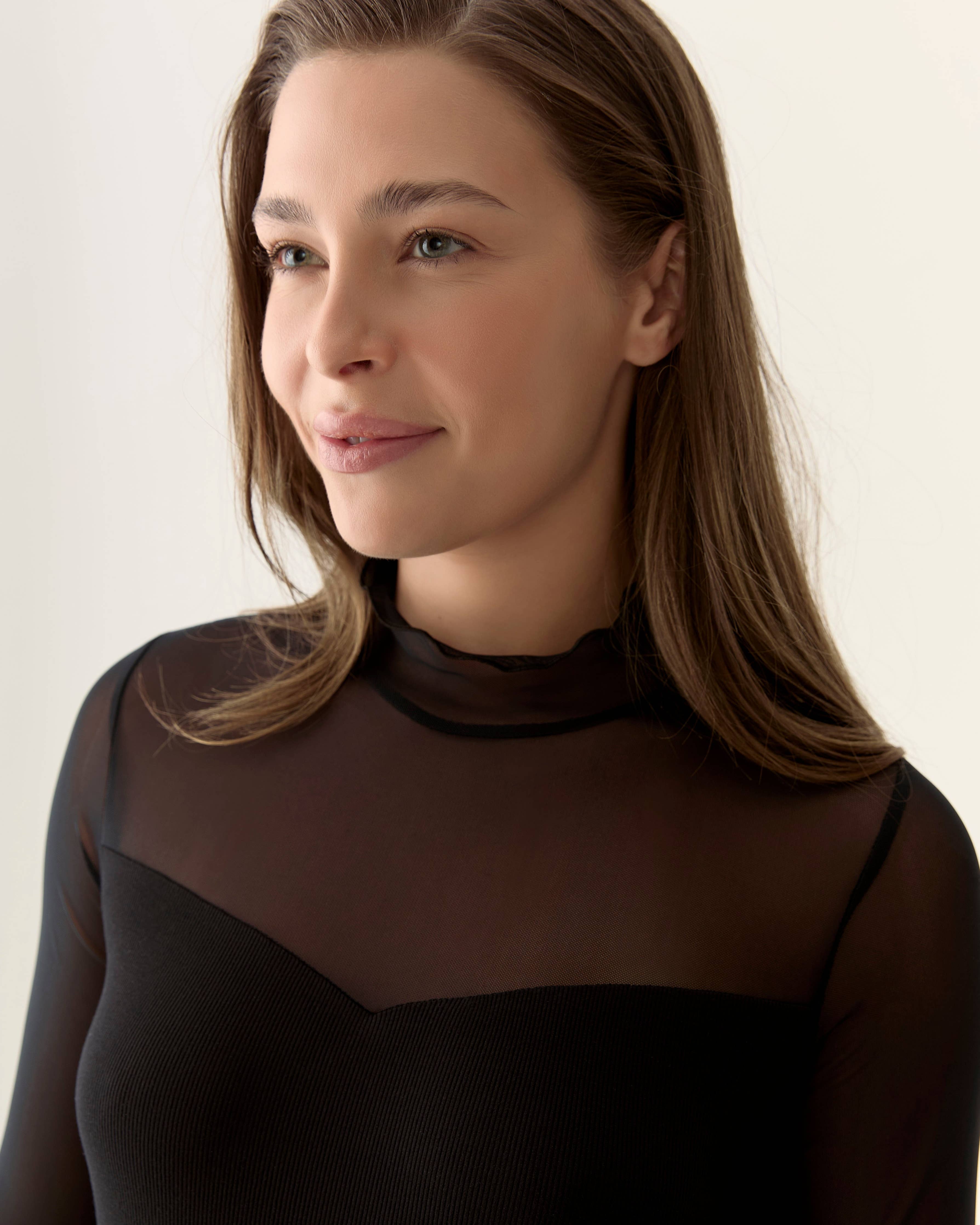 Sheer Sleeve Bodysuit in Black - Out of the Blue