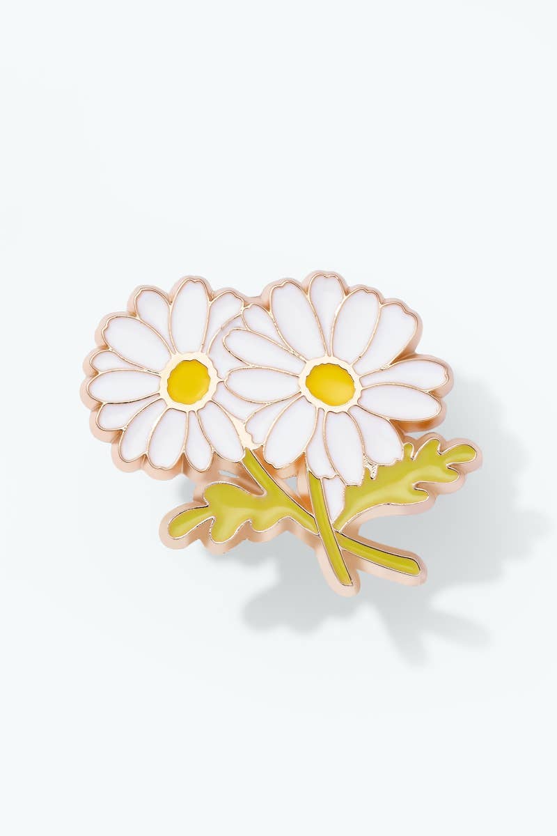 Daisy flower brooch with gold outline on a white background
